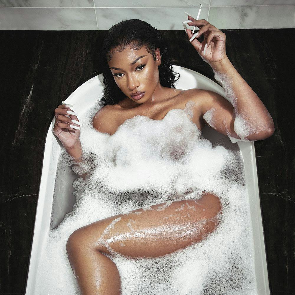 Cover of SOUNDCHECK featuring singer Megan Thee Stallion in a bathtub with a cigarette in her hand
