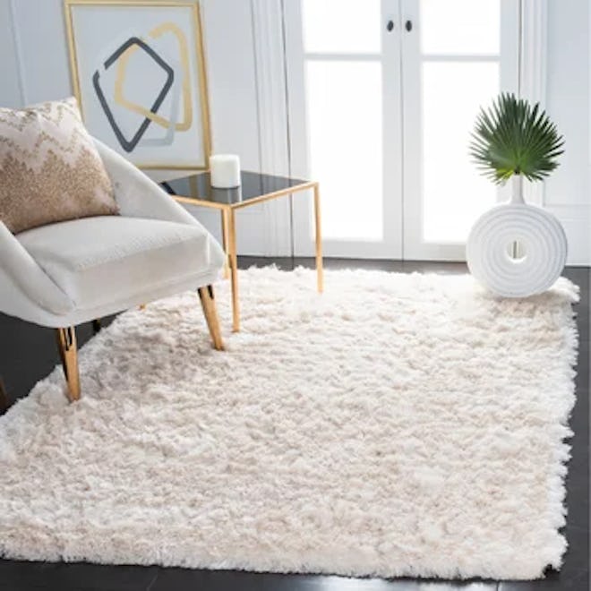 Shaggy tufted area rug in a creamy ivory color for lightening up a space