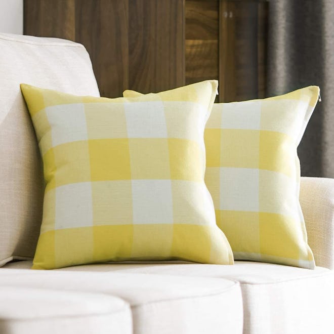 Plaid pillow covers in light pastel yellow