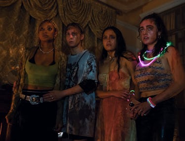 Amandla, Maria, Chase, and Rachel wearing glow sticks and looking scared