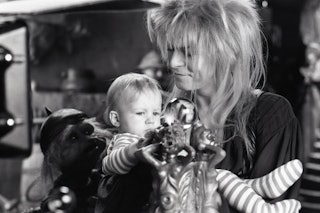 David Bowie holding Toby Froud on the set of Labyrinth.