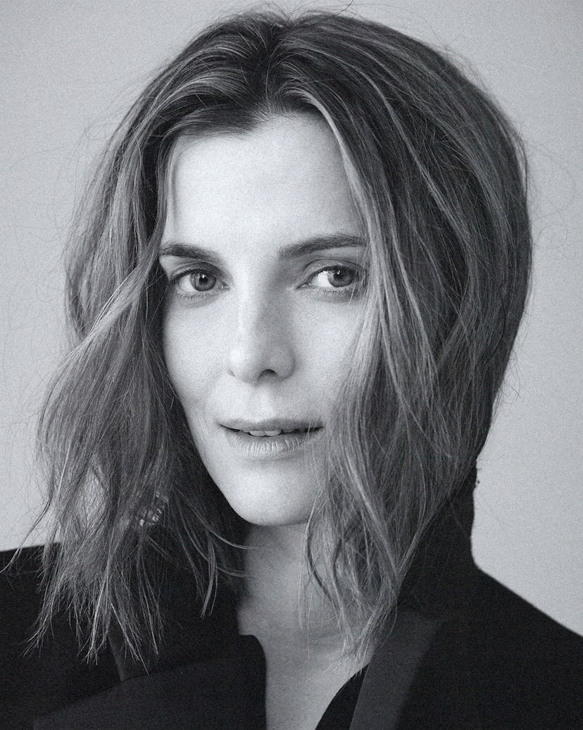 Portrait of Betty Gilpin in black and white.