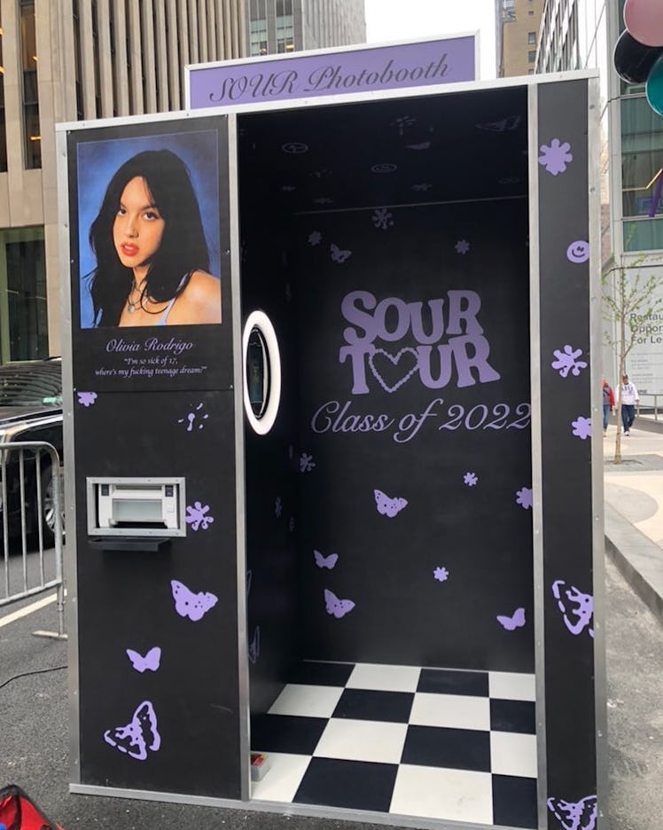 The 'Sour' tour bus experience for Olivia Rodrigo fans has a photobooth.