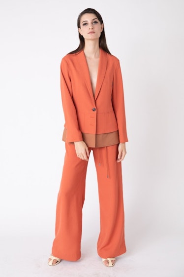This orange blazer from KZ_K STUDIO will help you recreate Blake Lively’s orange suit outfit.