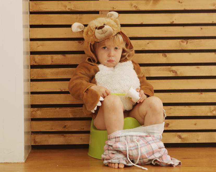 toddler sitting on potty, these potty training products can help 