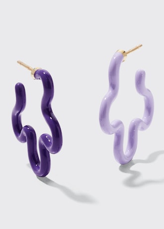 Bea Bongiasca Two-Tone Asymmetrical Flower Small Hoop Earrings in Lavender and Purple Enamel is a gr...