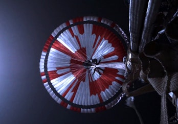 A circle with white and orange stripes represents the bottom of a parachute.