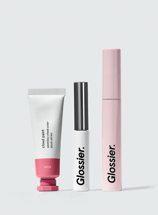 This starter makeup set from Glossier includes a travel-sized cheek color, brow tint, and mascara as...