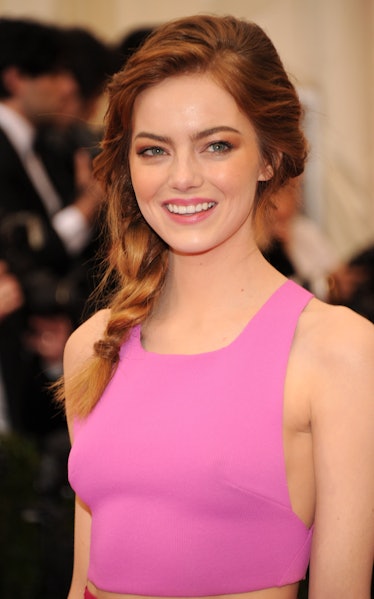 Emma Stone wearing a side braid at the 2014 Met Gala
