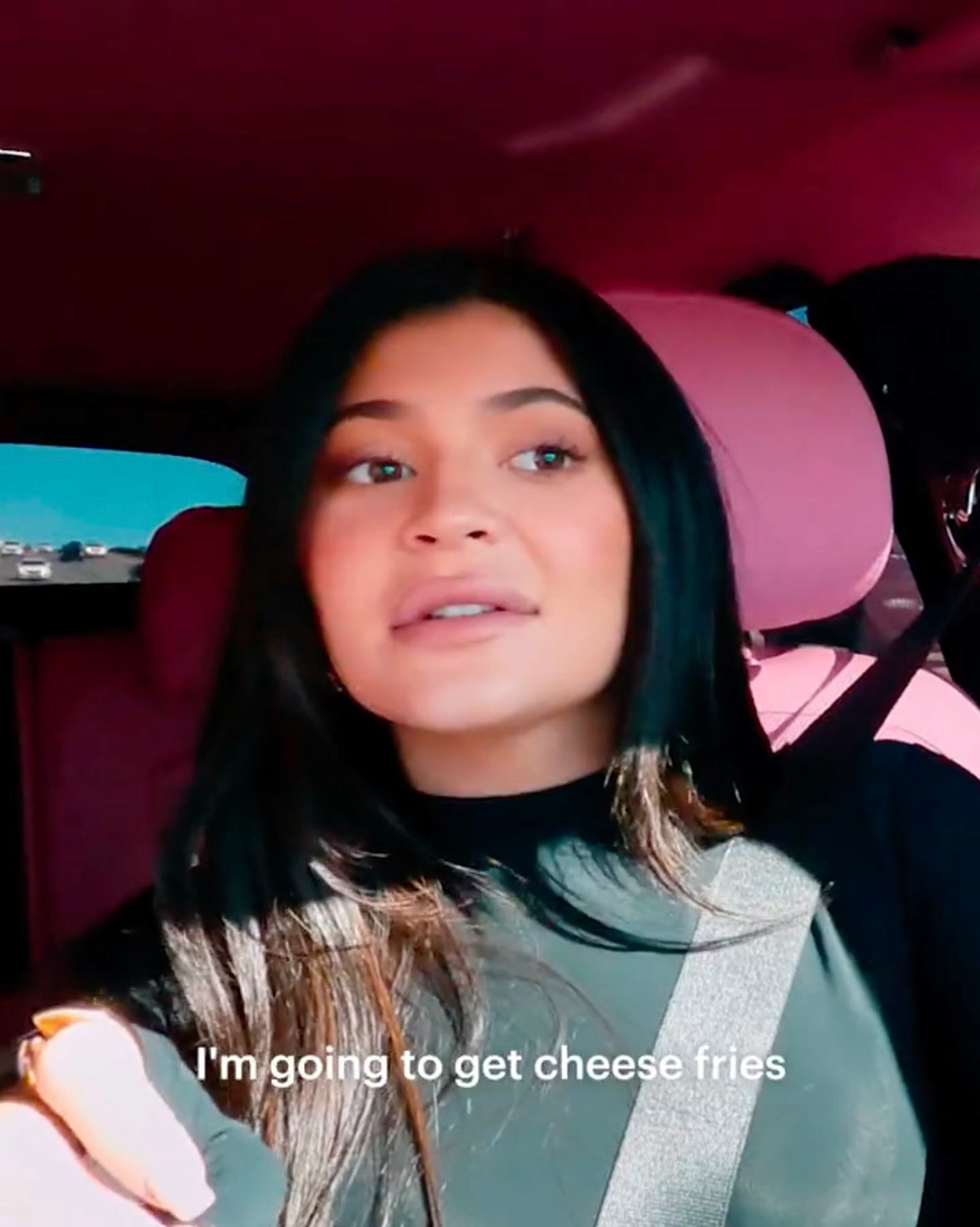Kylie Jenner craves a snack while in line at In-N-Out Burger, and it's so relatable.