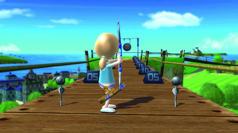 Woman playing archery on Wii Sports Resort.