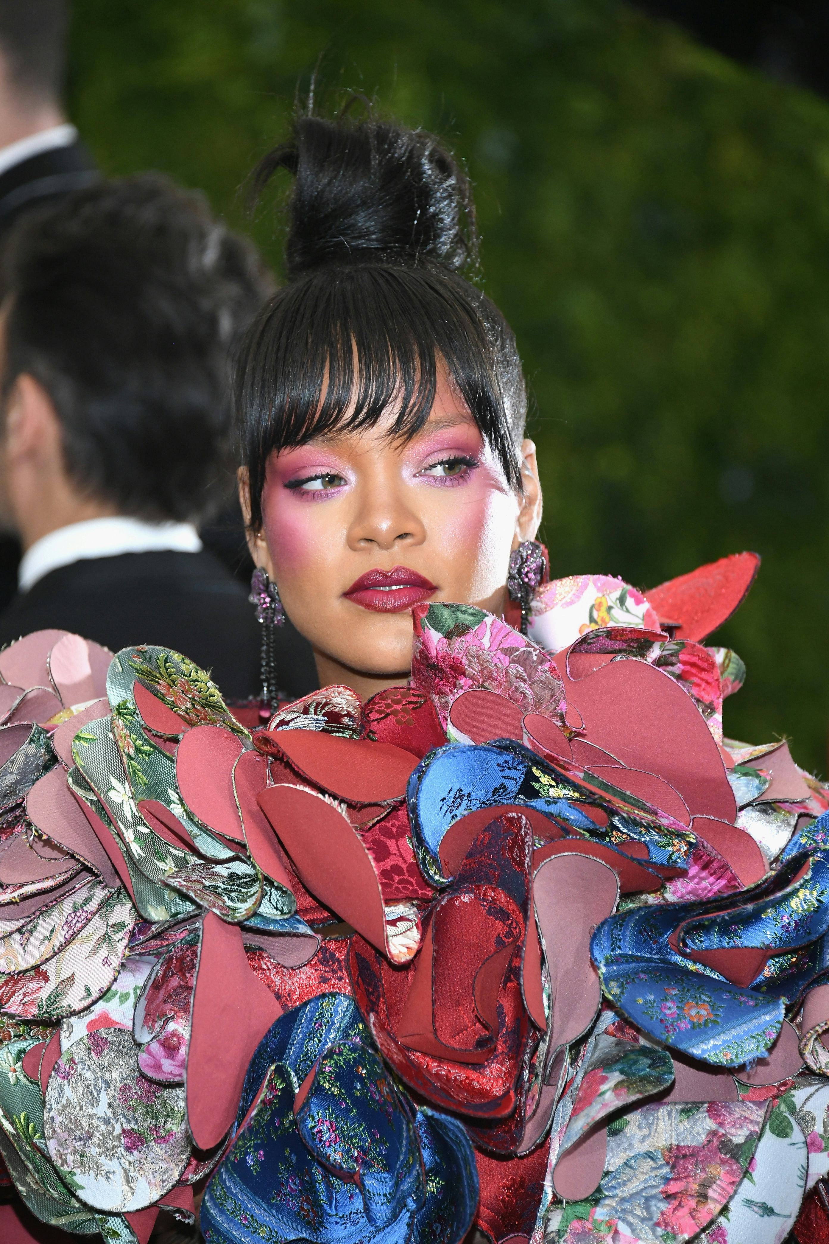 At the 2017 Met Gala, Rihanna sported high-drama blush and a topknot.