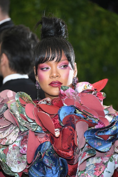 At the 2017 Met Gala, Rihanna sported high-drama blush and a topknot.