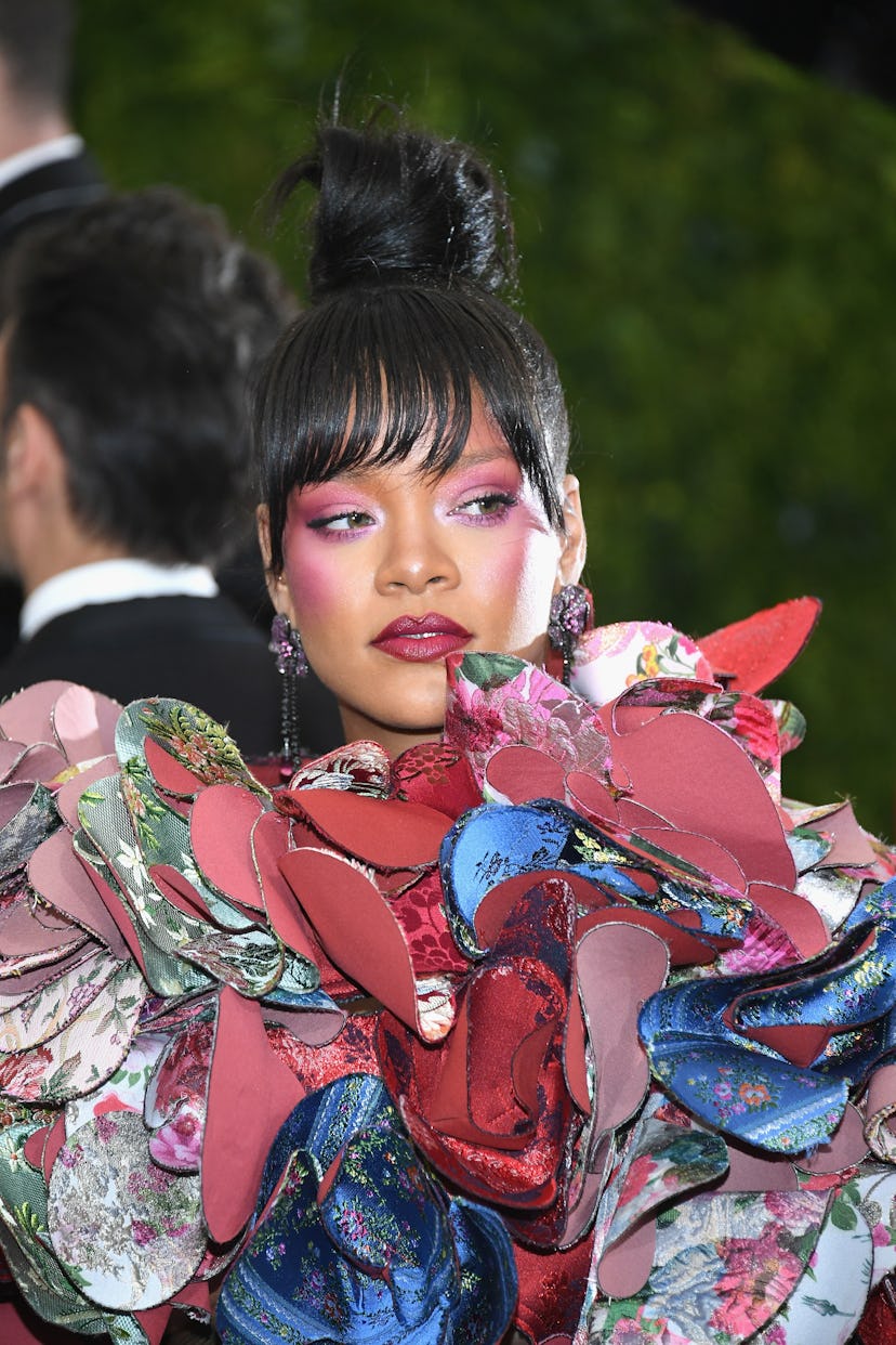 At the 2017 Met Gala, Rihanna sported high-drama blush and a topknot.