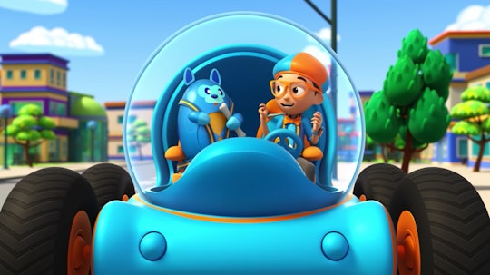 An animated Blippi sits in a magic car with a friend in 'Blippi Wonders,' coming to Netflix May 2022