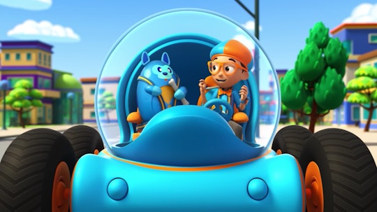 An animated Blippi sits in a magic car with a friend in 'Blippi Wonders,' coming to Netflix May 2022