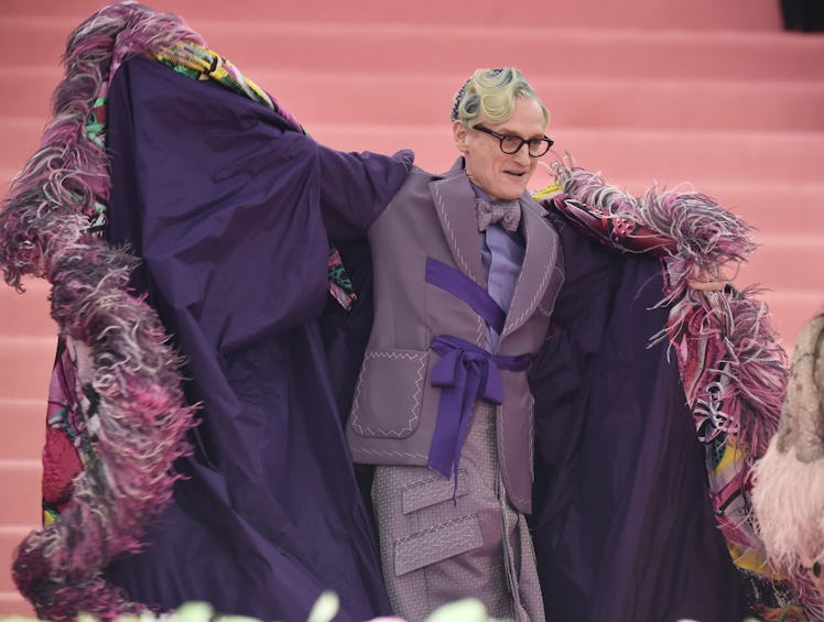 Hamish Bowles wearing a cape at the 2019 Met Gala