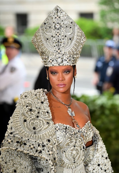 Rihanna attends the Heavenly Bodies: Fashion & The Catholic Imagination Costume Institute Gala at Th...