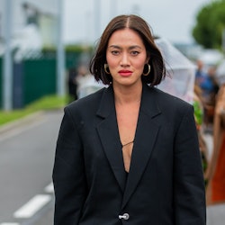 Tiffany Hsu seen wearing blazer, bordeaux Hermés bag, and net skirt outside the Hermés show during P...