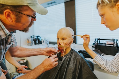 SFX make-up supervisor Conor O’Sullivan and prosthetic make-up artist Emily Jones applying prostheti...
