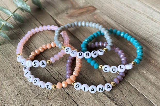 These customized name bracelets feature colorful beads that are personalized with children's names a...