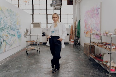 Kylie standing in her studio