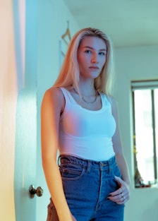 Sofia Hublitz wearing a white tank top and jeans