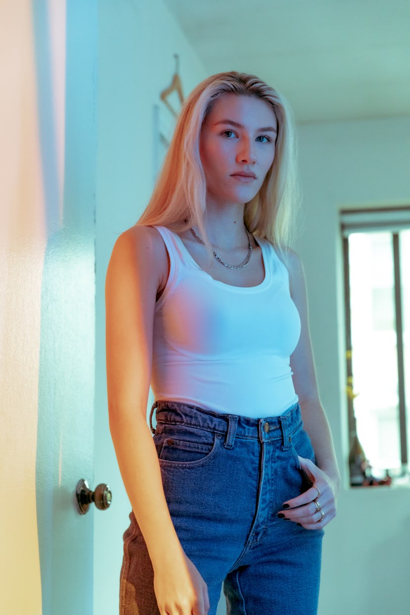 Sofia Hublitz wearing a white tank top and jeans