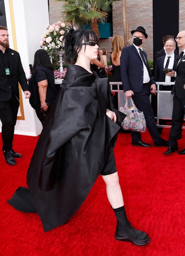 Billie Eilish walking the 2022 Grammys red carpet wearing head-to-toe black Rick Owens