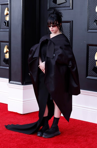 Billie Eilish wearing sunglasses and all-black Rick Owens at the 2022 Grammys