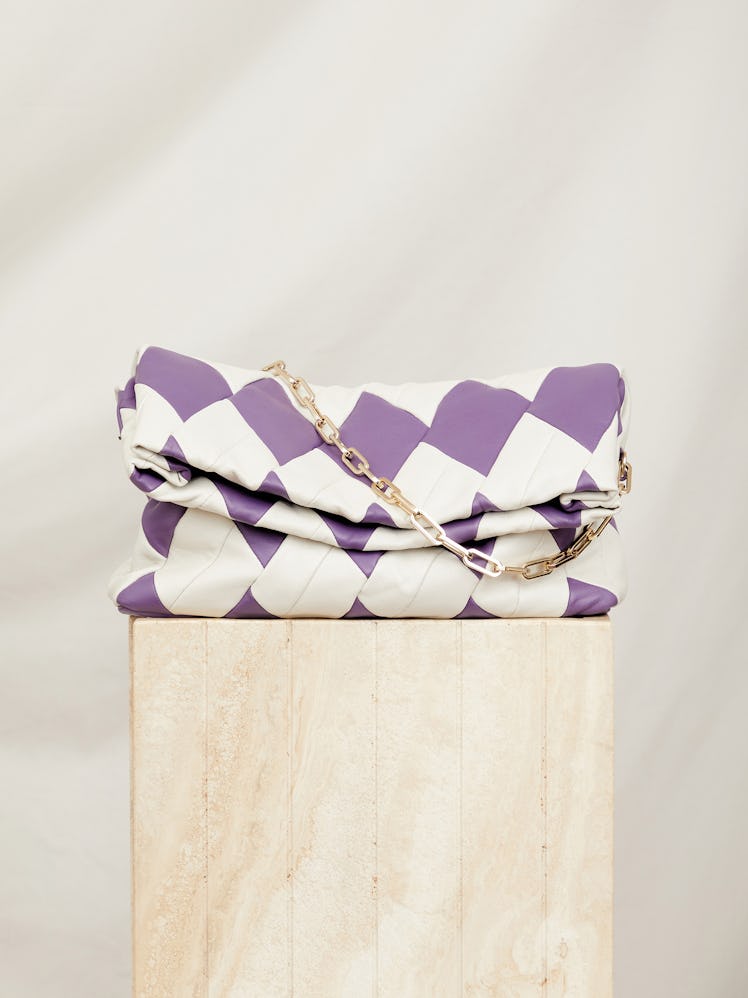 This white and purple patchwork bag from RECO is made from upcycled leather.