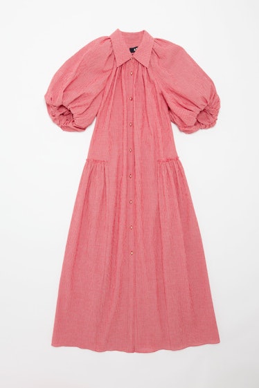 This pink puff sleeve dress from ASHLYN adheres to high sustainability standards.