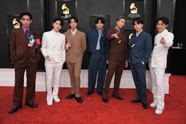 Kpop group BTS wearing Louis Vuitton suits at  the 64th Annual GRAMMY Awards at MGM Grand Garden Are...