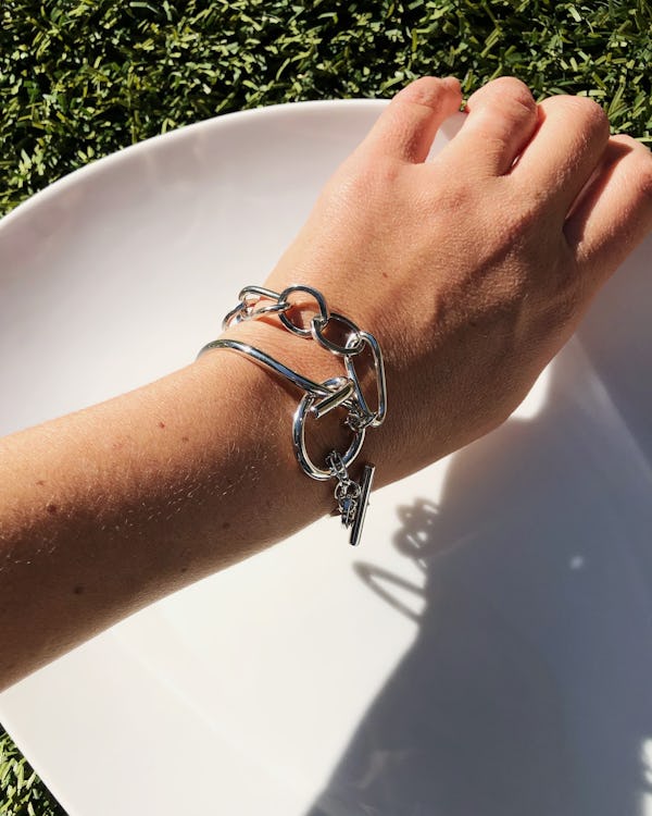a silver chain-link bracelet by Mounser