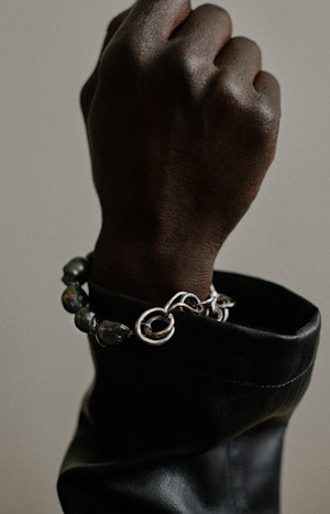 a silver link bracelet from Completedworks