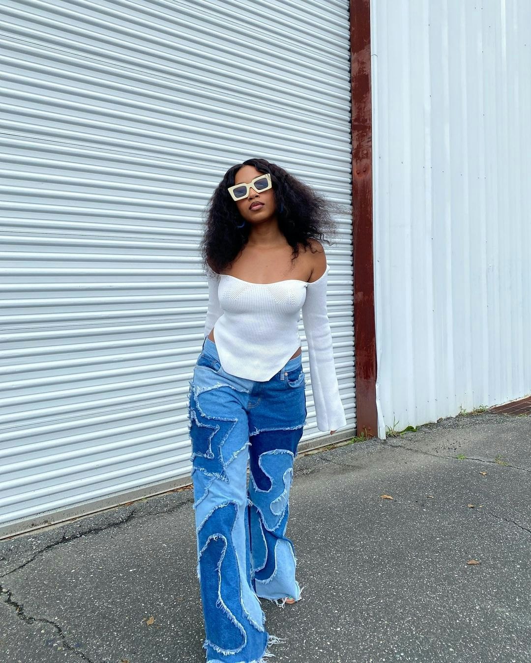 Going-Out Tops & Baggy Jeans Is The Latest Outfit Formula To Try