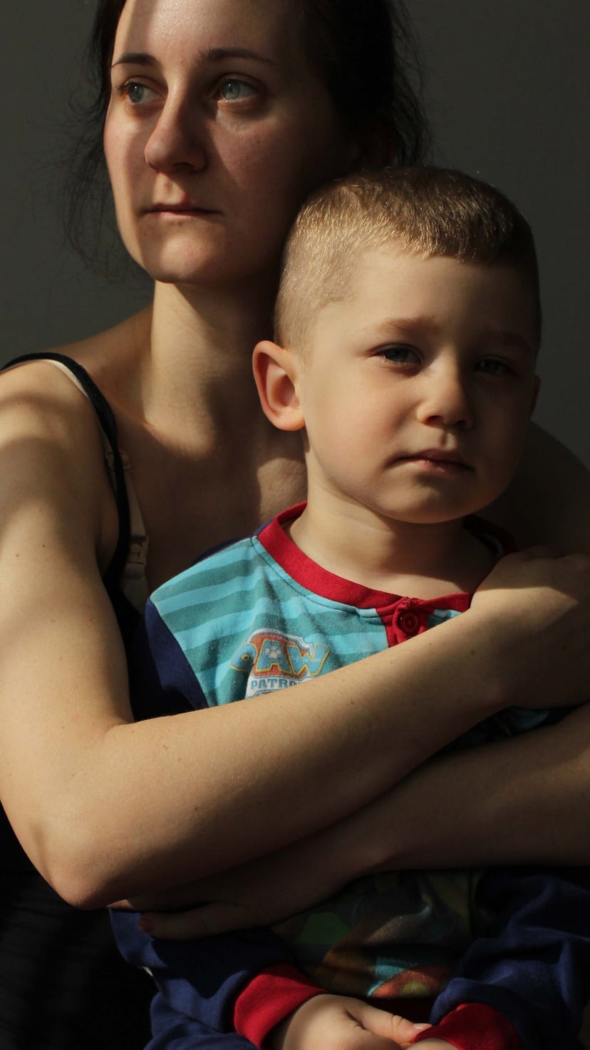 A Ukrainian mother and her son, portrait in war.