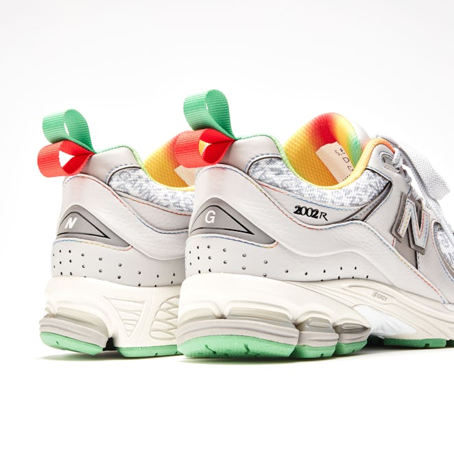 Ganni And New Balance collaboration On A Y2K Sneaker in gray and green from the back