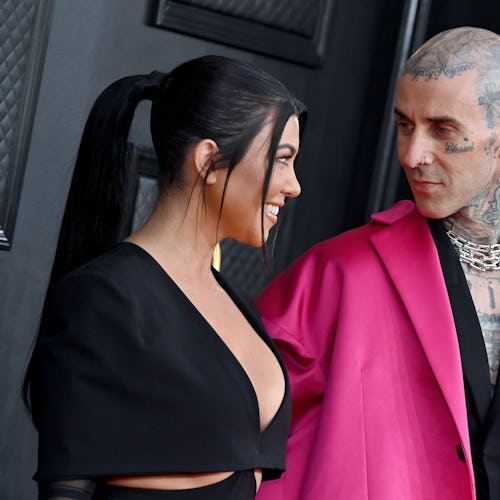 Kourtney Kardashian and Travis Barker attend the 64th Annual GRAMMY Awards