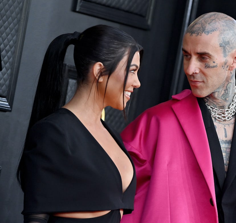 Kourtney Kardashian and Travis Barker attend the 64th Annual GRAMMY Awards