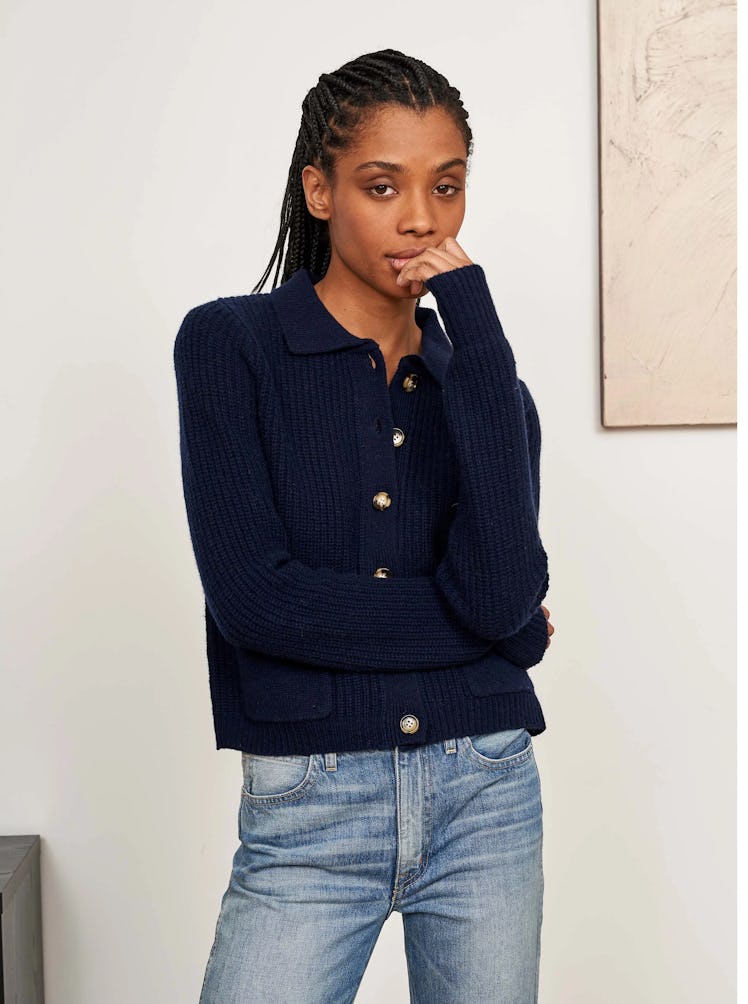 This navy blue polo cardigan from La Ligne will help you master the preppy trend in 2022.