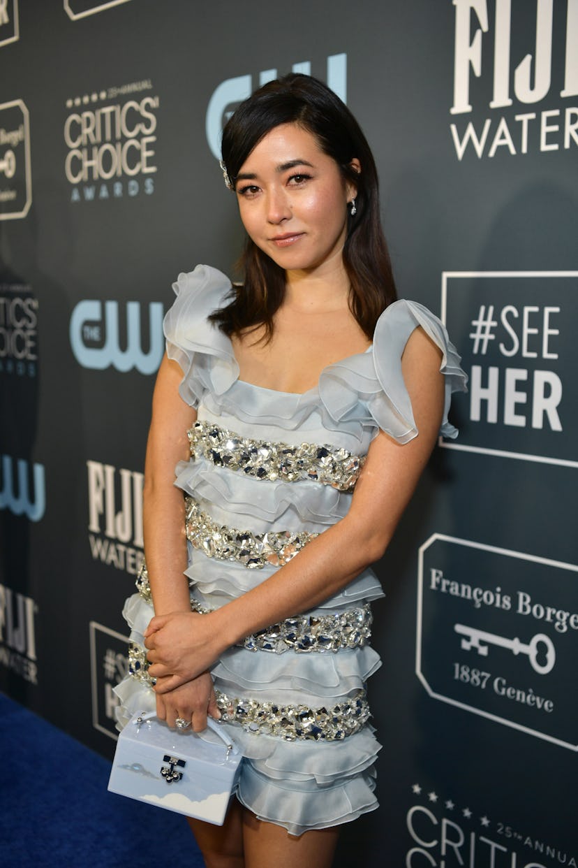 Maya Erskine wearing a pale blue dress