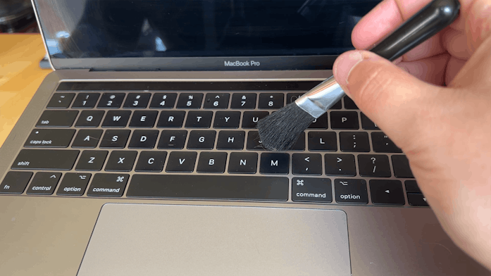 A quick brushing of your keyboard here and there will keep it tidy in the long run.