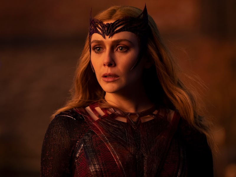 Wanda Maximoff (Elizabeth Olsen) wearing her scarlet witch costume looking shocked in doctor strange...