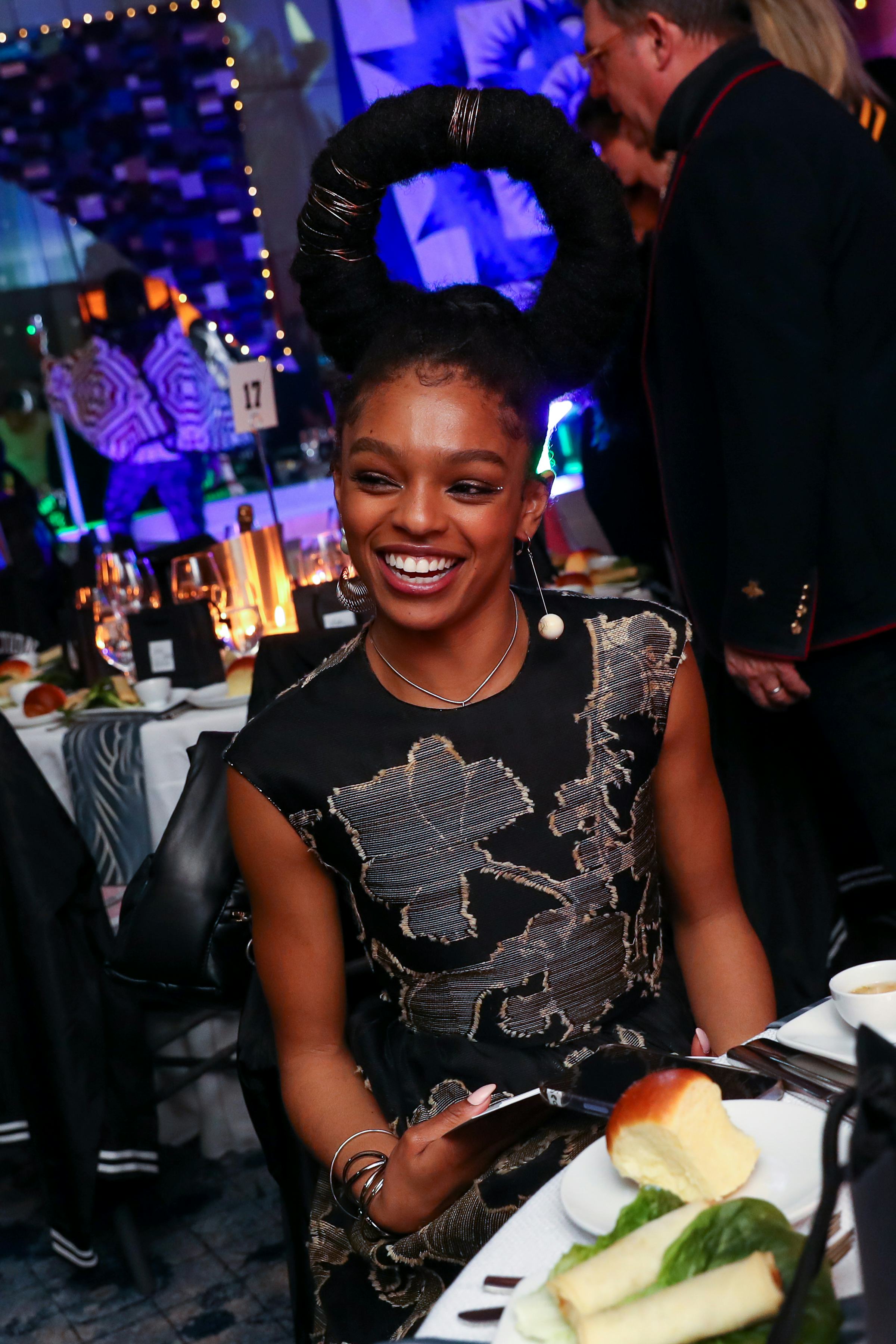 Selah Marley seated at dinner