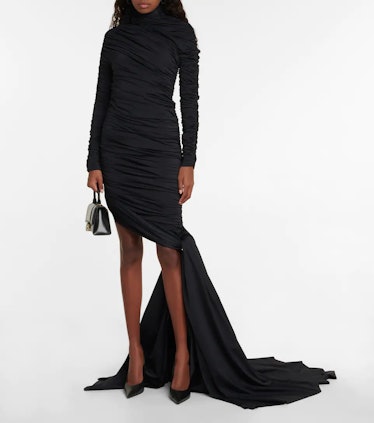 black dress with trailing fabric