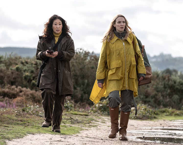 Sandra Oh as Eve and Jodie Comer as Villanelle walking in the countryside in the Killing Eve season ...