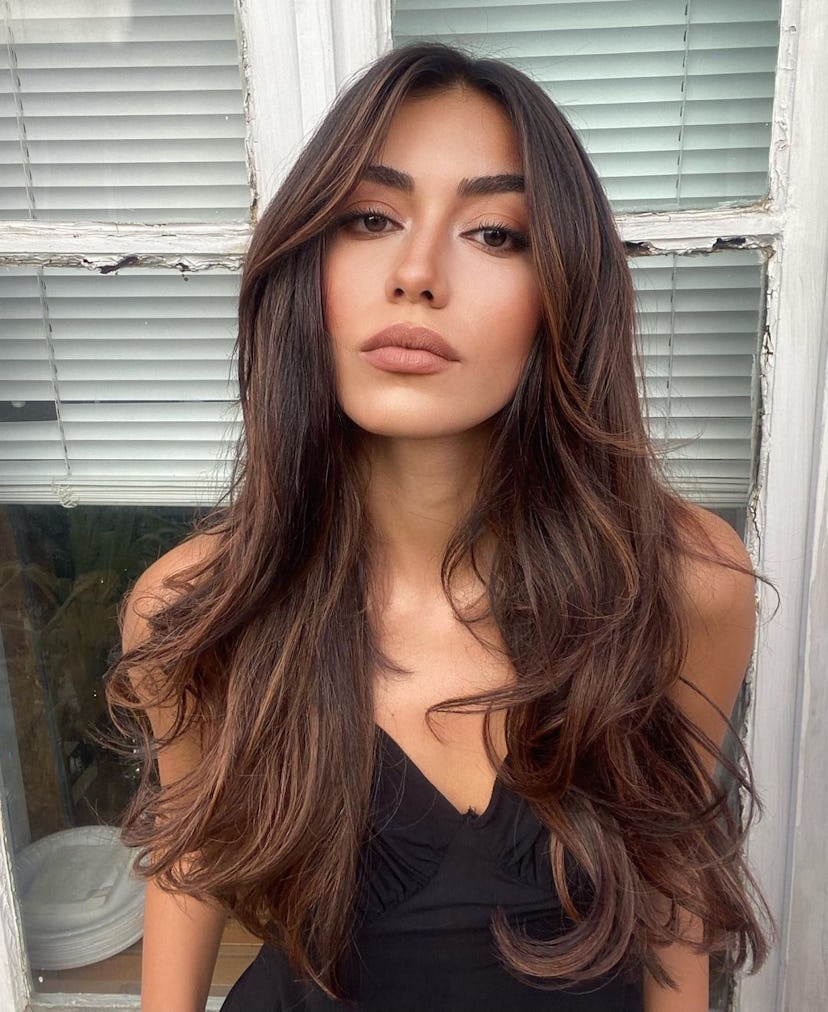 Tape-in hair extensions.