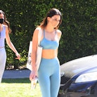 Kendall Jenner wearing Alo's high-waist airlift leggings ahead of the Aloversary sale.