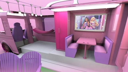 The World of barbie tour includes Barbie's pink camper.